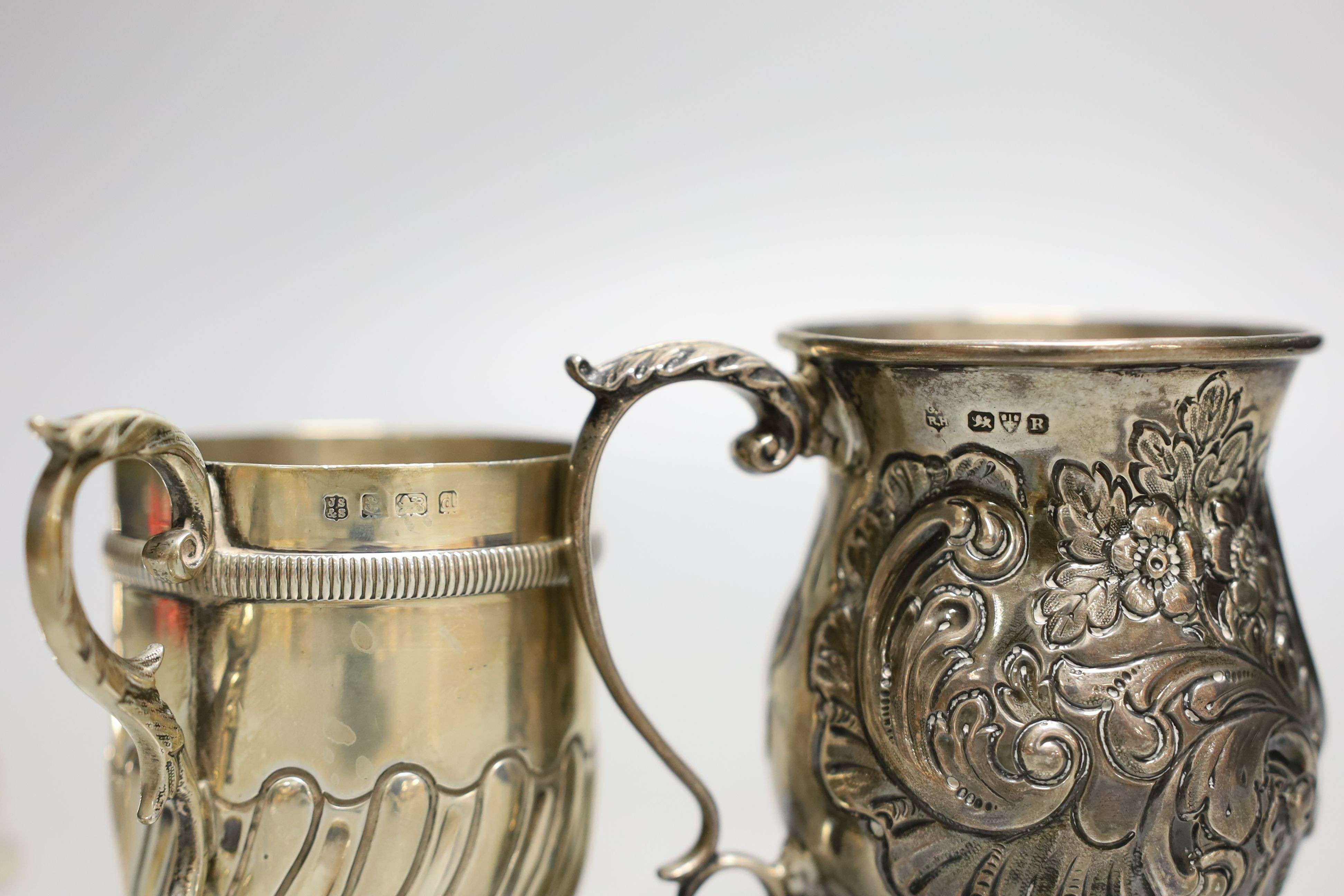 Two late 19th/early 20th century silver christening mugs and a modern silver wine funnel, 9.5oz.